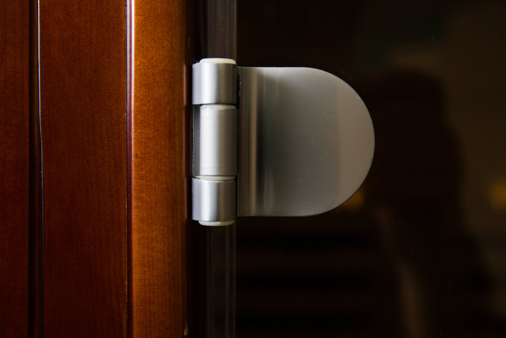 NaturalDoctor four-person red cedar sauna — door hinge detail (ND-R4S configuration)