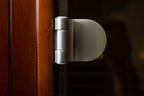 NaturalDoctor four-person red cedar sauna — door hinge detail (ND-R4S configuration)